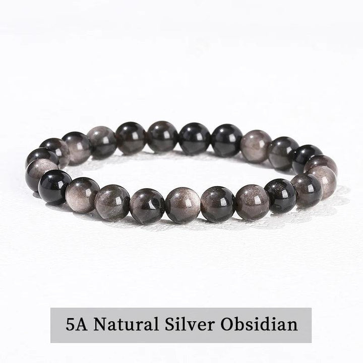 Natural Silver Obsidian beaded bracelet, a grounding crystal stretch accessory from our 30+ stone collection.