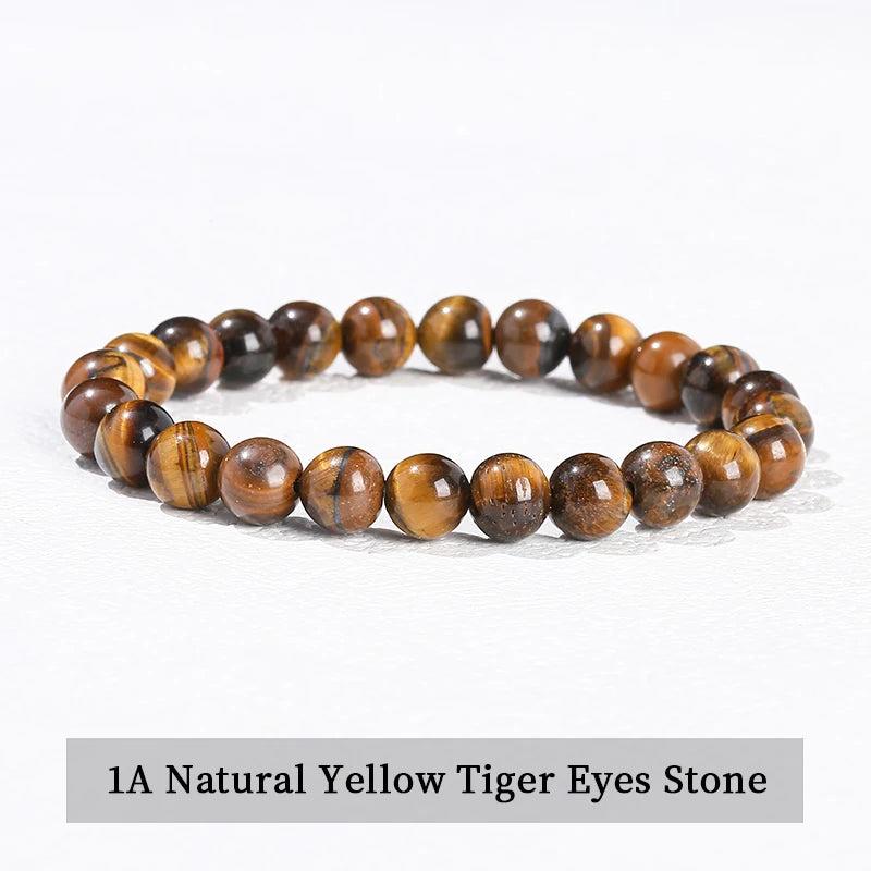 Natural Tiger's Eye beaded bracelet with grounding golden-brown stones on an elastic stretch band for daily energy.