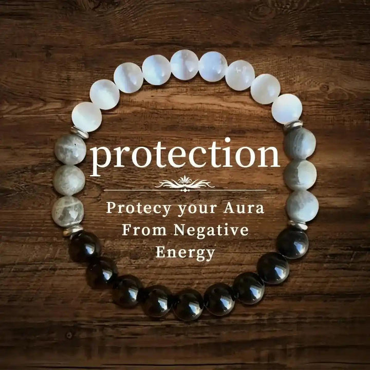 Natural Stone Beaded Healing Bracelet with white moonstone, gray jasper, and black tourmaline for protection.
