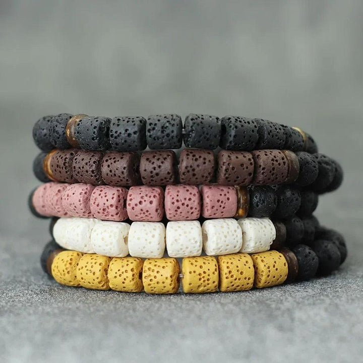 Stack of five Natural Stone Coconut Bead Handmade Men's Bracelets in black, brown, pink, white, and yellow.