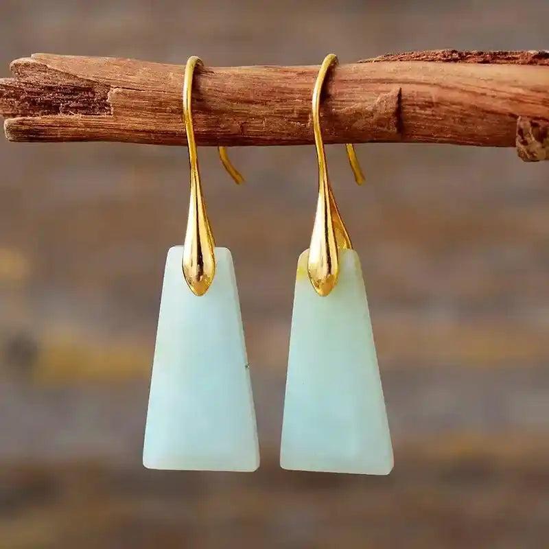 Trapezoid Natural Stone Drop Earrings with light blue gemstones and gold hooks, promoting balance and positive vibes.