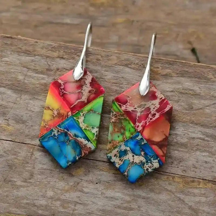 Crystal Destiny natural stone geometric drop earrings with vibrant red, blue, green, and yellow jasper.