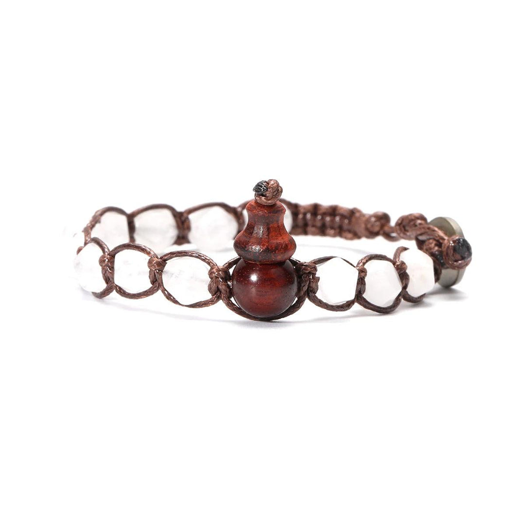 Natural Stone Handwoven Adjustable Unisex Bracelet with clear quartz beads and a wooden gourd charm.