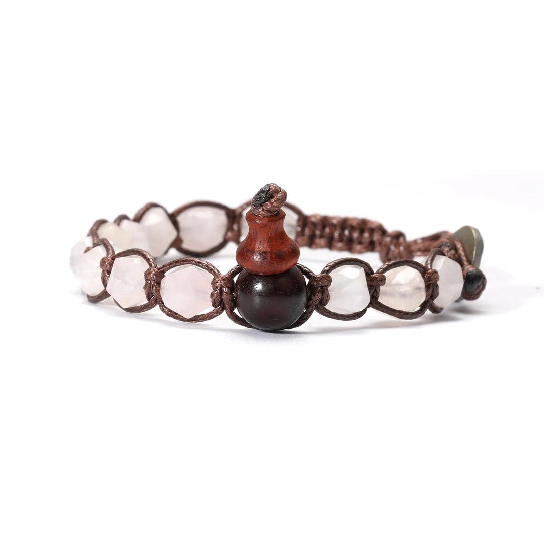 Natural Stone Handwoven Adjustable Unisex Bracelet with pale pink Rose Quartz beads and a dark wood gourd charm.