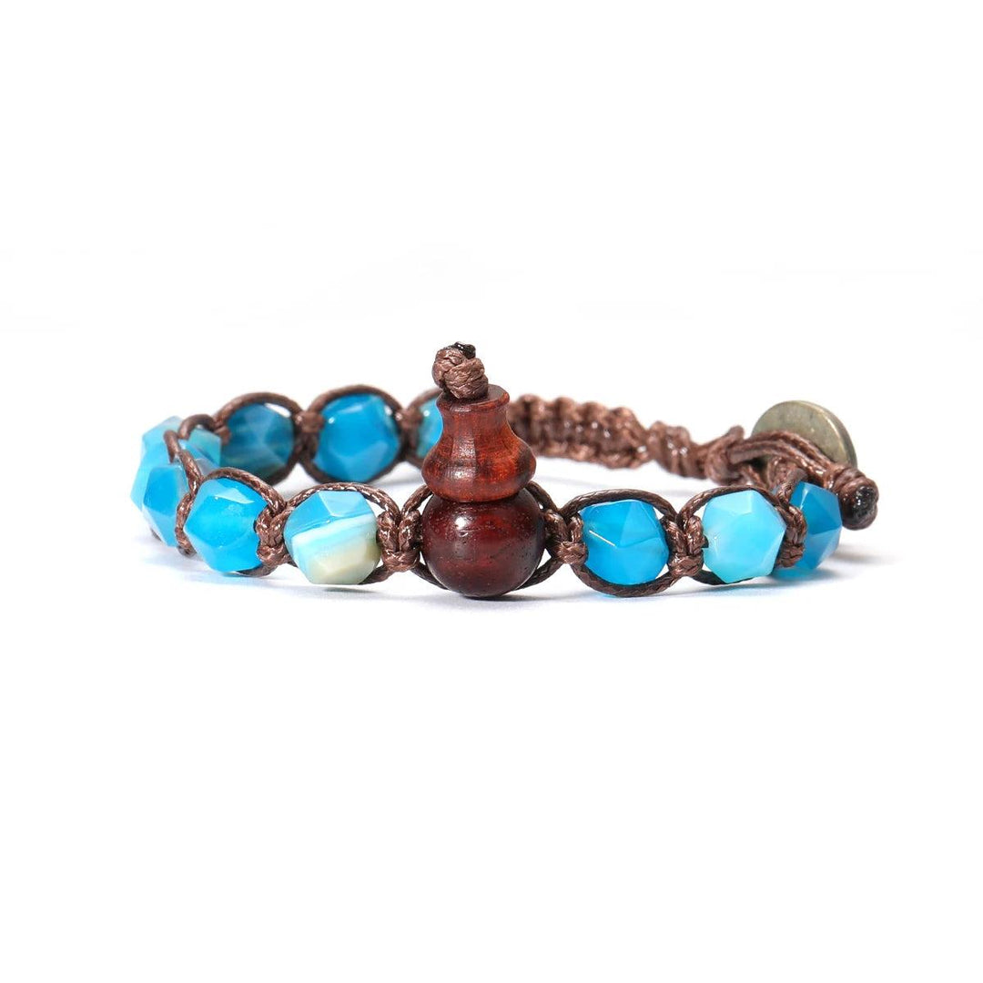 Natural Stone Handwoven Adjustable Unisex Bracelet with vibrant blue semi-precious stone beads and a grounding wooden accent.