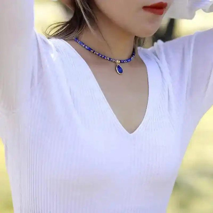 Natural Stone Teardrop Choker Necklace with exquisite blue gemstone beads and a unique teardrop pendant.