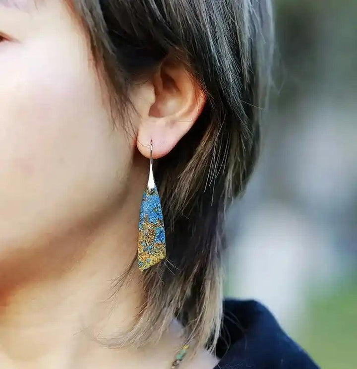 Natural Stone Waterdrop Earrings with blue and gold patterns, offering grounding crystal energy.
