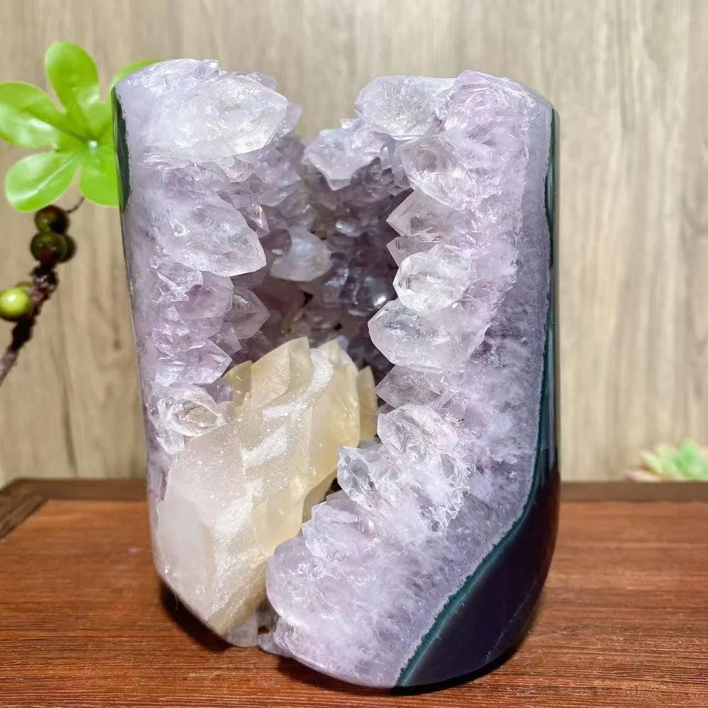 Raw amethyst and calcite crystal geode ornament for healing, featuring sparkling purple clusters and golden stone.
