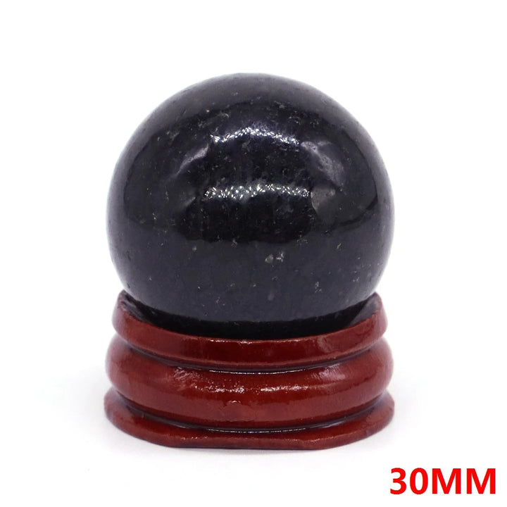 Nuumite Crystal Sphere with Stand