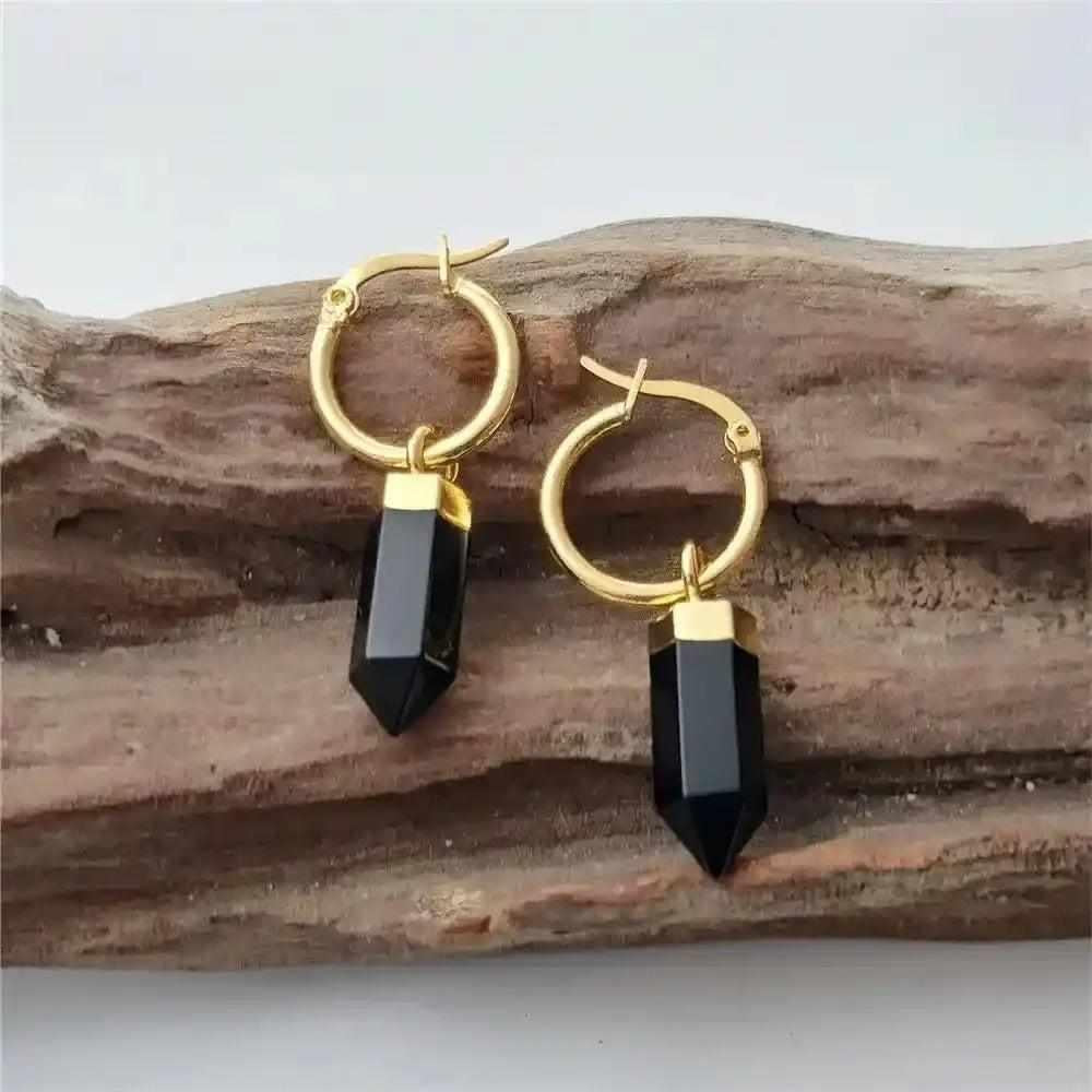 Sleek black obsidian crystal point dangle earrings with gold-plated hoops, offering protection and grounding energy.