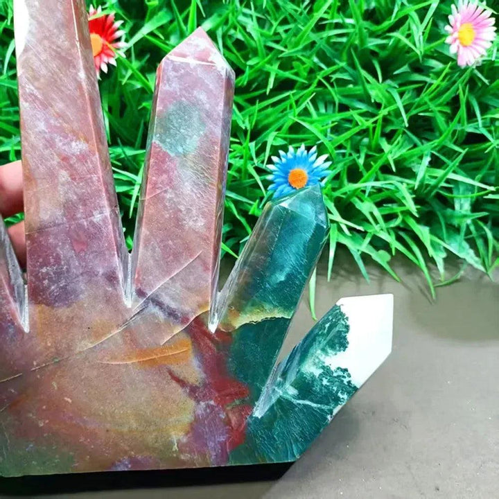 Large Ocean Jasper 5-point crystal tower with green, cream, pink, and rust orbicular patterns.