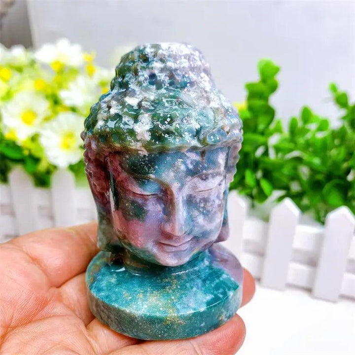 Ocean Jasper crystal Buddha head statue, 80mm, with swirling green, cream, pink, and purple patterns.