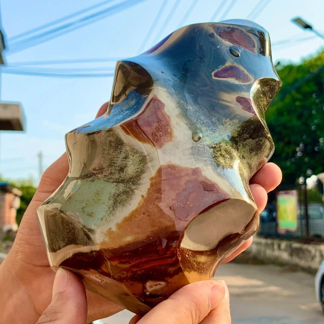 Polished Ocean Jasper flame freeform, showcasing its unique orbicular patterns in green, pink, cream, and red.