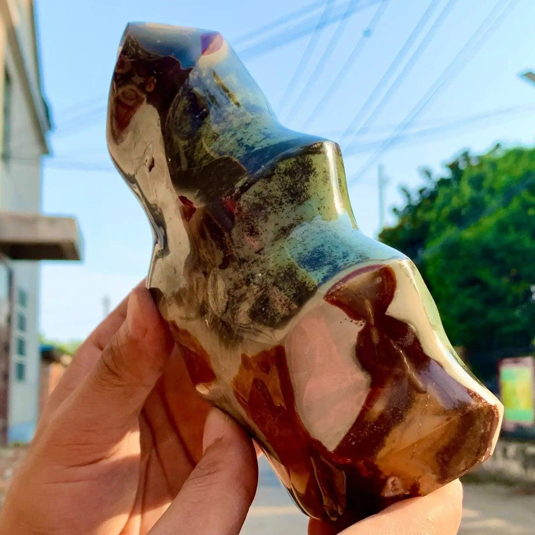 Ocean Jasper crystal carved flame freeform, showcasing multicolor orbicular patterns for joyful energy.