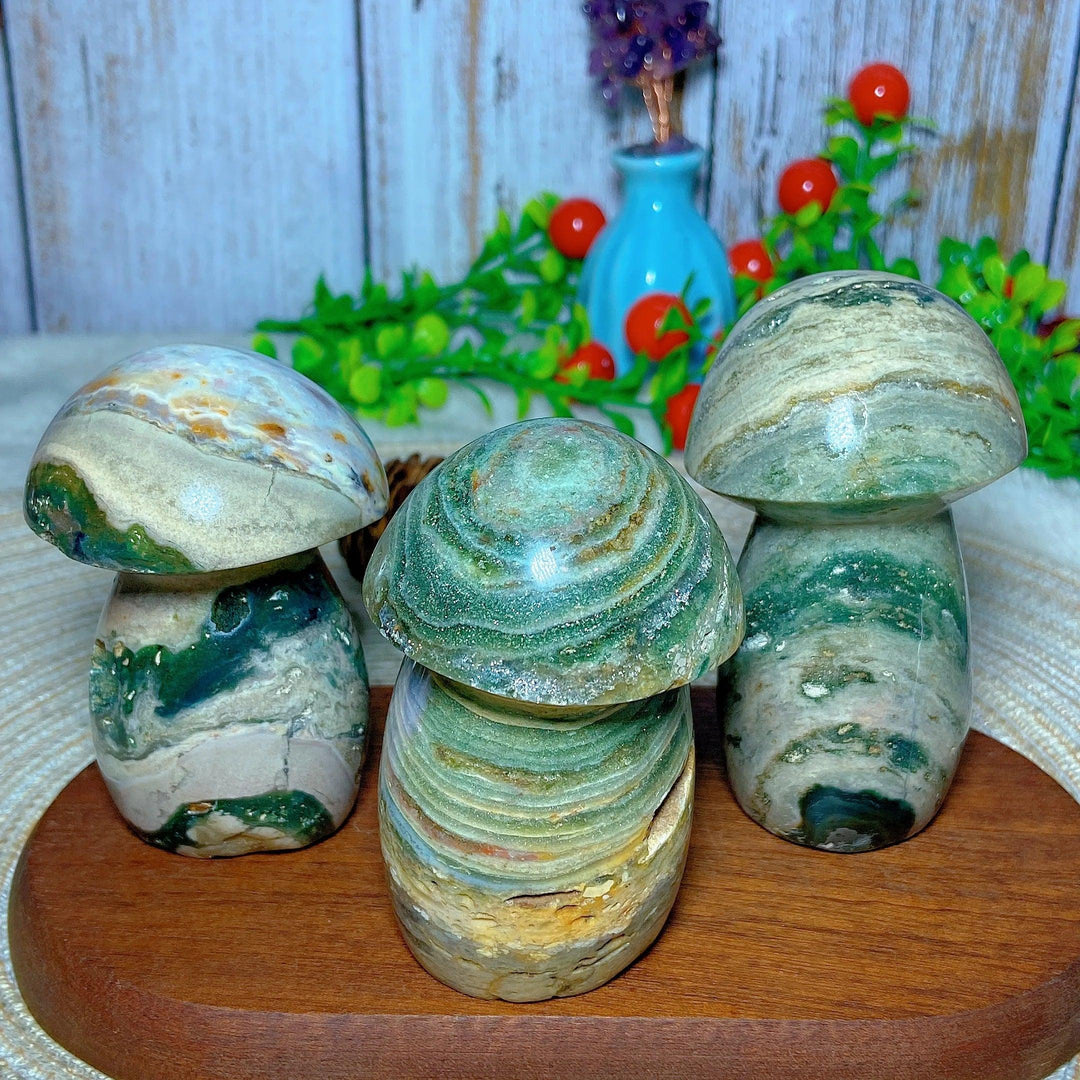 Colorful natural Ocean Jasper mushroom carvings, perfect for Reiki healing and home decor.