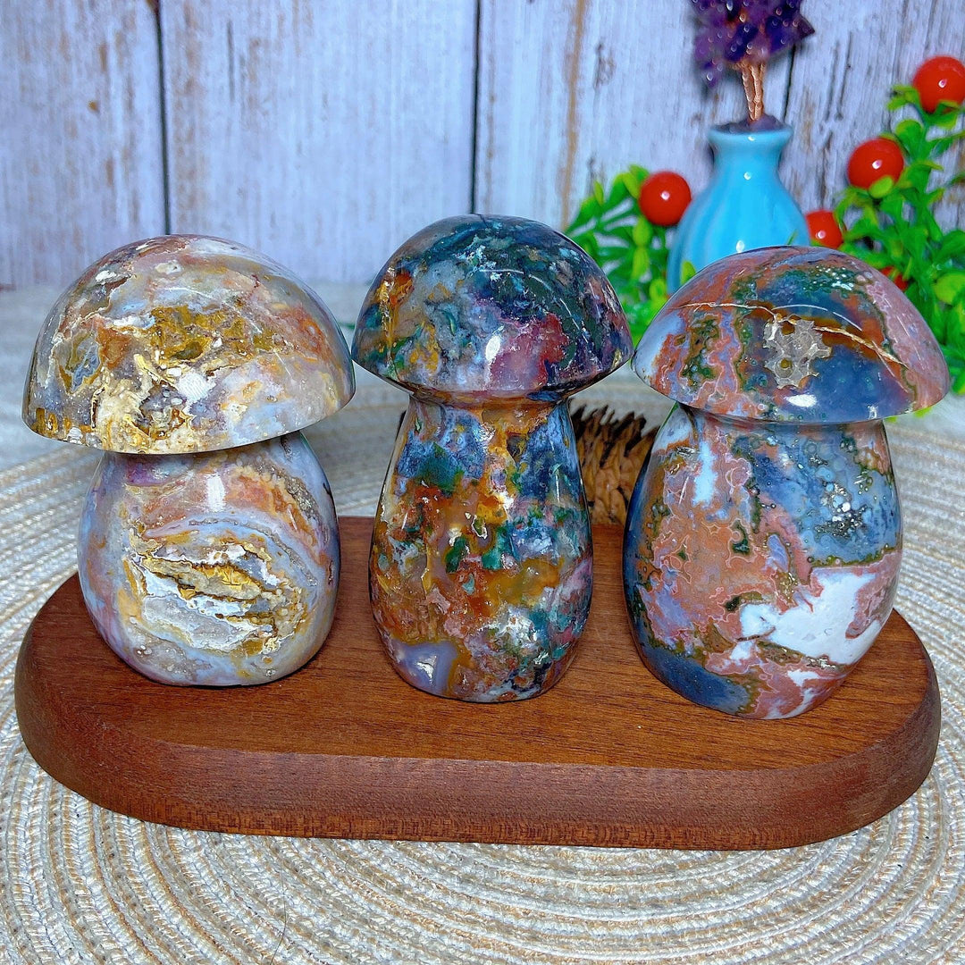 Colorful Ocean Jasper mushroom carvings, natural crystal druzy geode gemstones for Reiki and home decor.