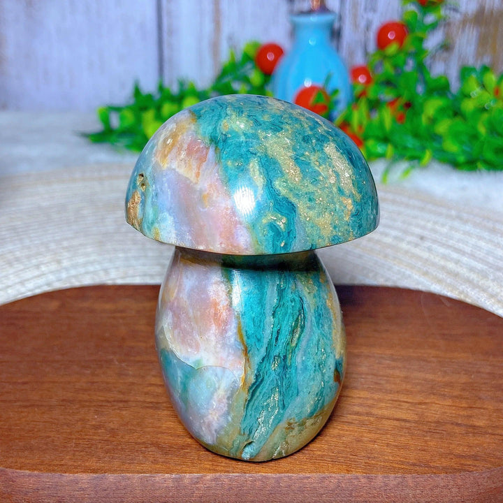 Colorful Ocean Jasper mushroom carving with druzy, a natural gemstone for Reiki and home decor.