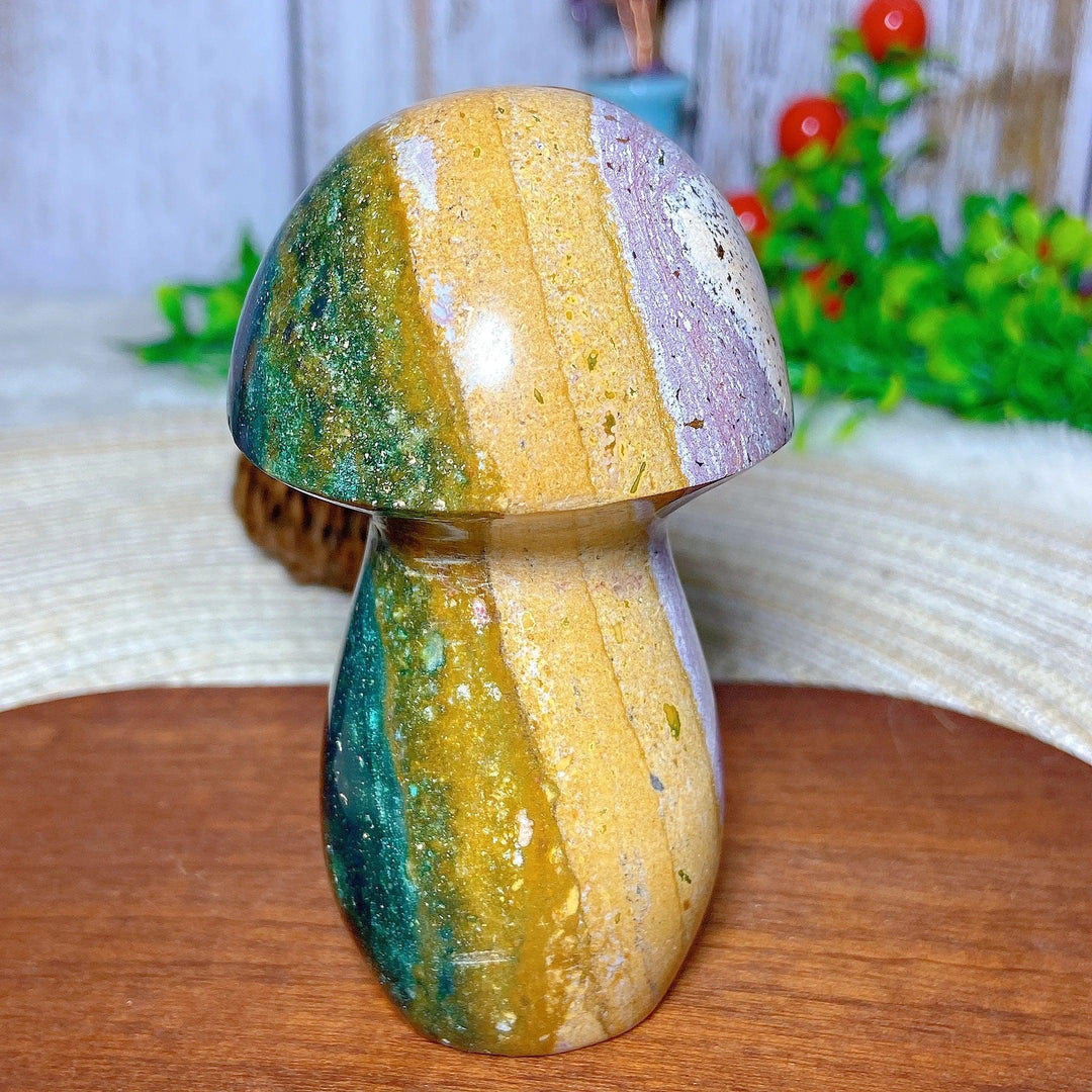 Colorful Ocean Jasper mushroom carving, a natural crystal gemstone for Reiki, home decor, and energy healing.