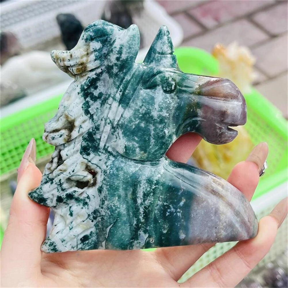 Vivid Ocean Jasper crystal carved unicorn figurine, showcasing swirling greens, creams, and pinks for healing and joy.