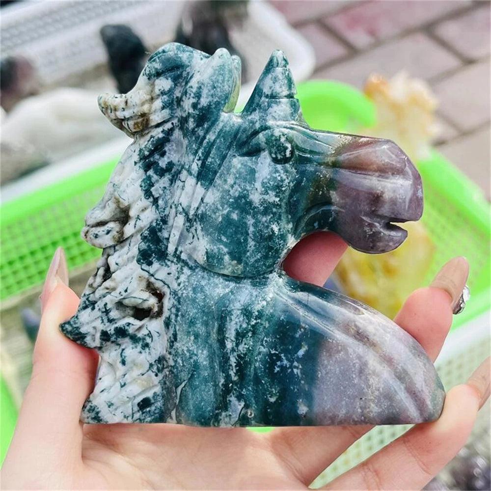 Hand-carved Ocean Jasper unicorn figurine, showcasing swirling greens, creams, and purples for healing and joy.