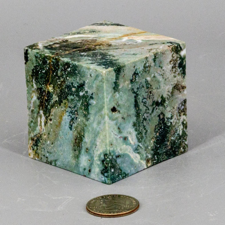 Ocean Jasper Crystal Cut Corner Cube, polished, with warm creams and soft greens, resonating with Heart, Solar Plexus, and Sacral Chakras.