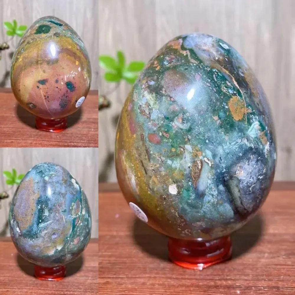 Ocean Jasper crystal egg from Crystal Destiny, featuring green, pink, and brown swirls, radiating peaceful energy.