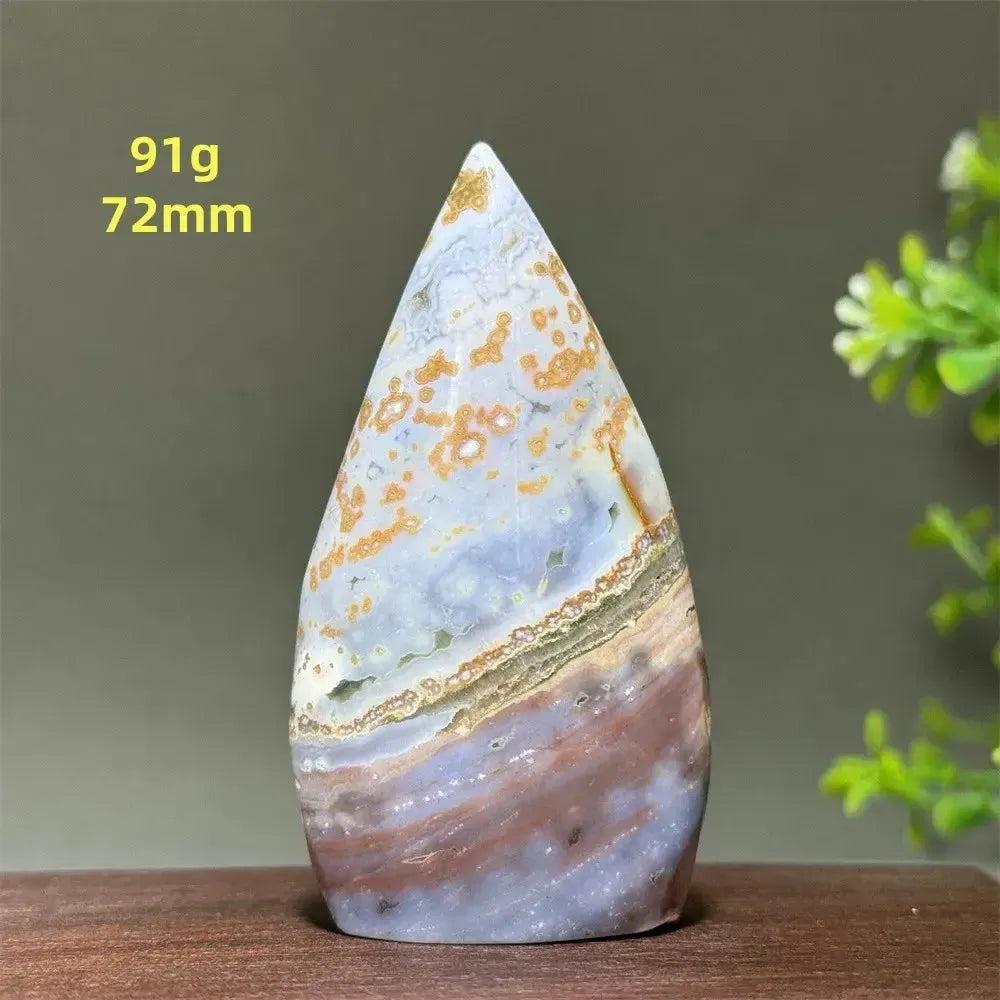 Ocean Jasper freeform crystal, 91g, 72mm, with orbicular patterns in green, cream, rust, and brown.