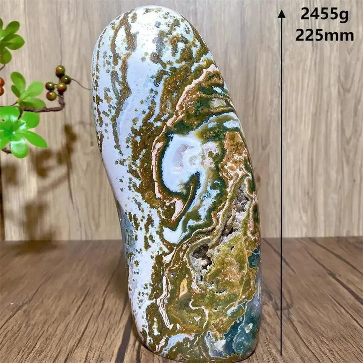 Large Ocean Jasper Freeform Crystal: Swirling green, cream, pink, and earthy tones, polished smooth, nurturing energy.