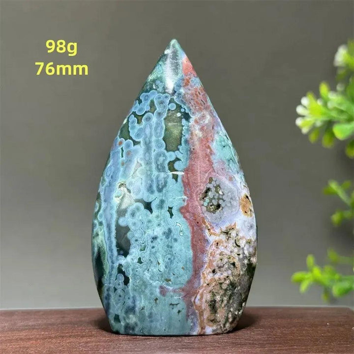 Ocean Jasper Crystal Freeform Orbicular Stone Polished. Green, cream, rust, and blue orbicular patterns with druzy pockets.