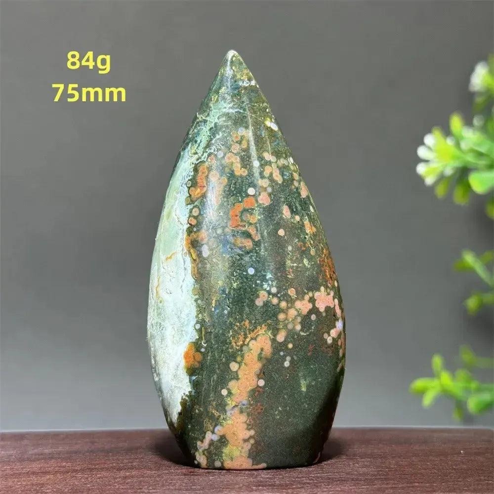 Polished Ocean Jasper freeform orbicular stone, 84g, 75mm, with green, cream, and rust patterns for joy and balance.
