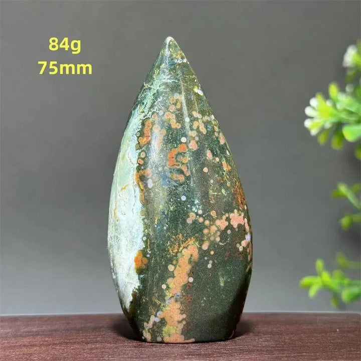 Polished Ocean Jasper freeform orbicular stone, 84g, 75mm, with green, cream, and rust patterns for joy and balance.