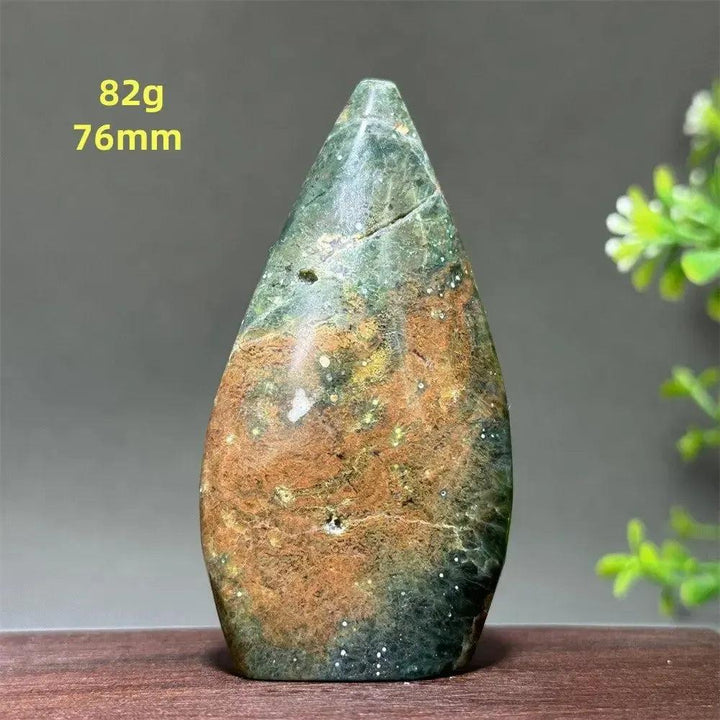Polished Ocean Jasper freeform orbicular stone, 82g, 76mm, with green, cream, and rust patterns for joy and balance.