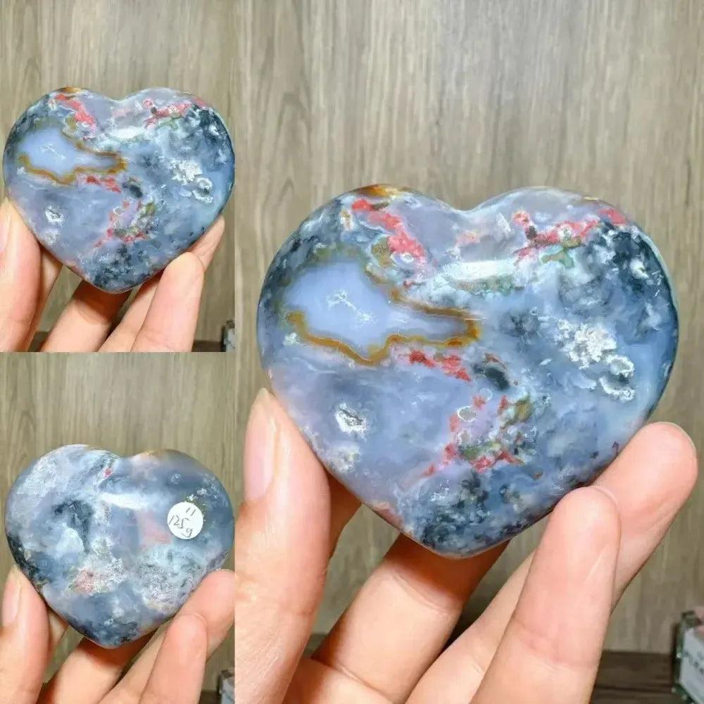 Ocean Jasper Crystal Heart from Crystal Destiny, featuring blue, red, and white swirls for emotional healing.