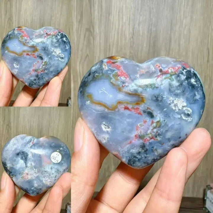 Ocean Jasper Crystal Heart from Crystal Destiny, featuring blue, red, and white swirls for emotional healing.