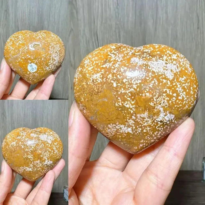 Ocean Jasper Crystal Heart from Crystal Destiny, featuring warm browns, yellows, and white orb patterns.