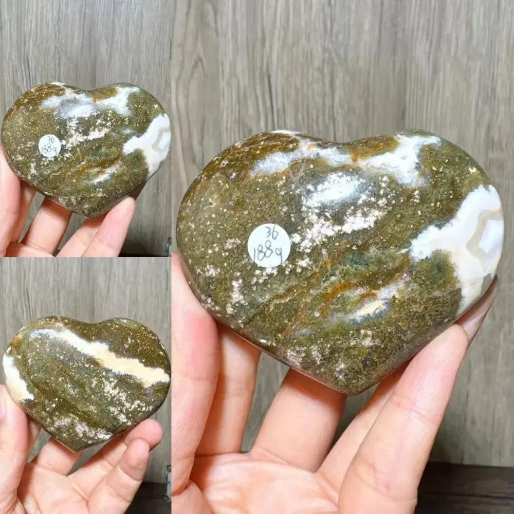 Ocean Jasper crystal heart from Crystal Destiny, featuring green, white, and brown swirling patterns.