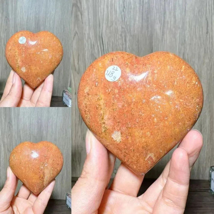 Polished orange and brown Ocean Jasper crystal heart from Crystal Destiny, symbolizing self-love and healing.