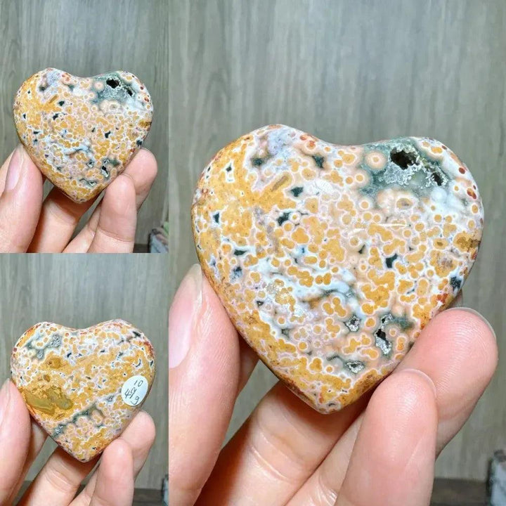 Ocean Jasper Crystal Heart from Crystal Destiny, featuring unique orange, green, and white orb patterns.