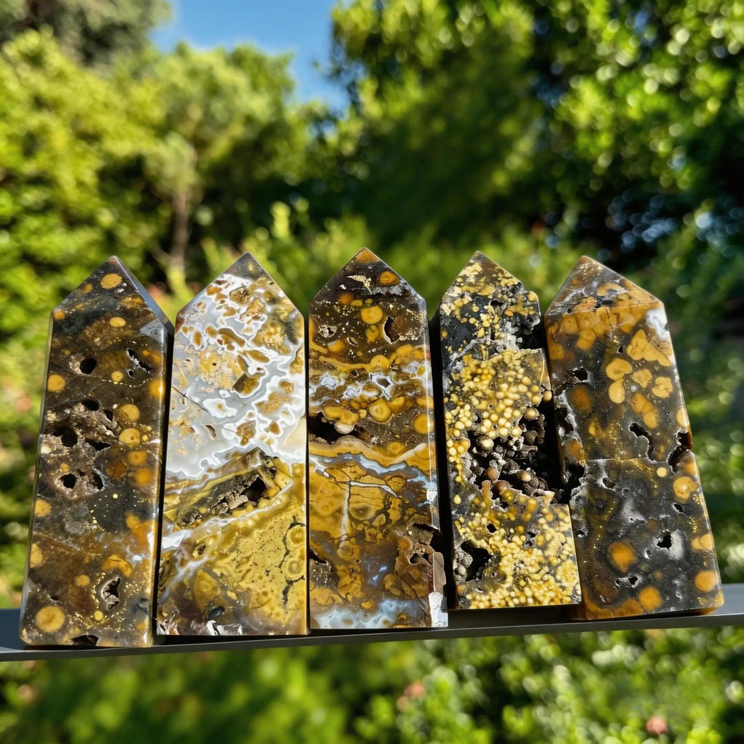 Five Ocean Jasper Crystal Obelisk Towers with rare orbicular patterns and druzy pockets for healing.