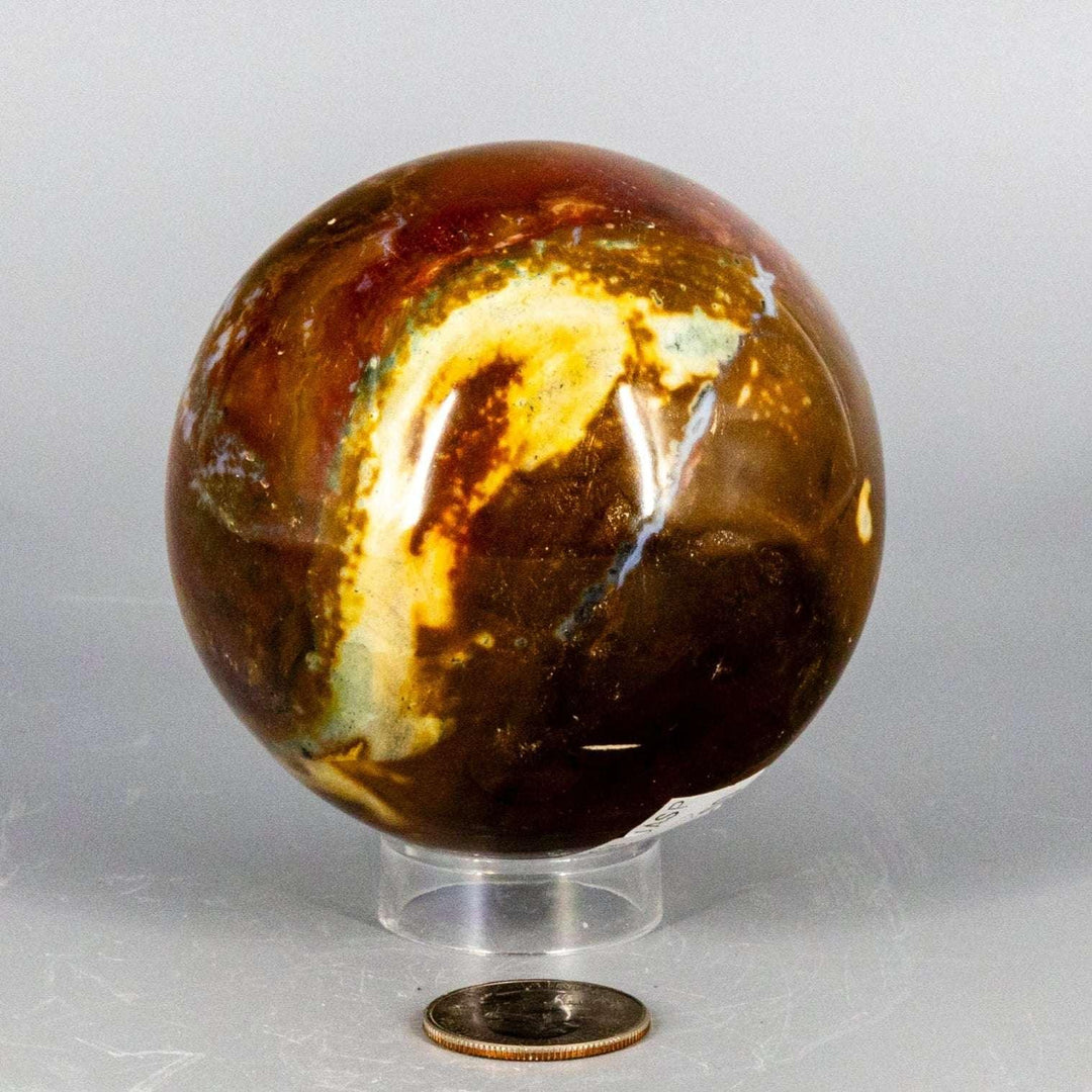 Grounding 80mm Ocean Jasper Sphere with natural orb patterns and swirling brown, gold, and blue-green colors.