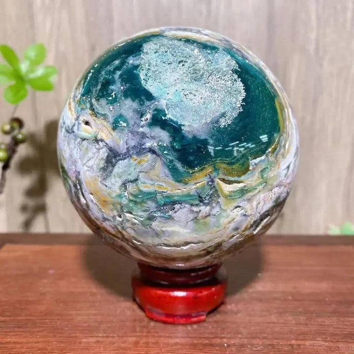Stunning Ocean Jasper Sphere XXL: 100mm orbicular greens, pinks, creams, yellows, earth tones on a red stand.