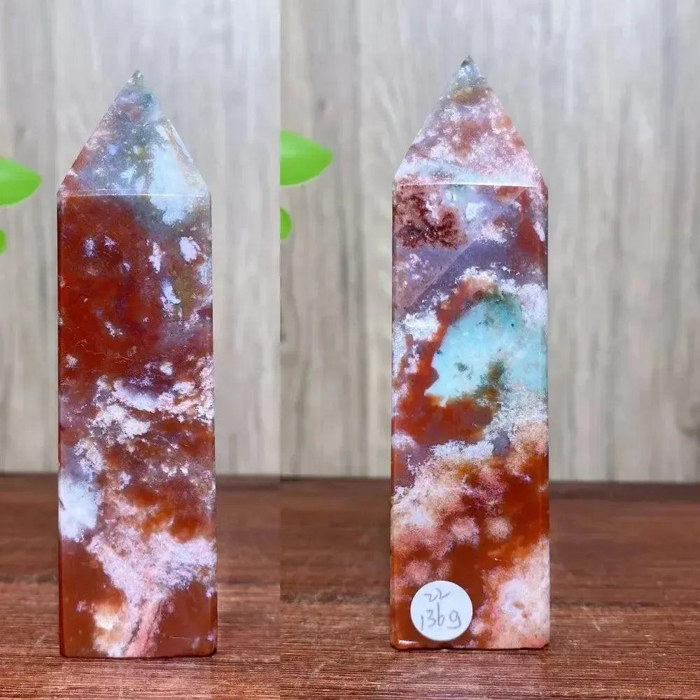 Ocean Jasper crystal tower from Crystal Destiny, featuring vibrant red, white, and teal patterns for healing.