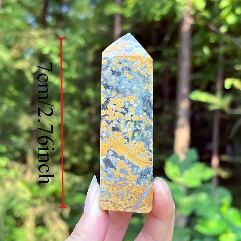 Ocean Jasper crystal tower, 7cm, with natural orbicular patterns in yellow, grey, and white.