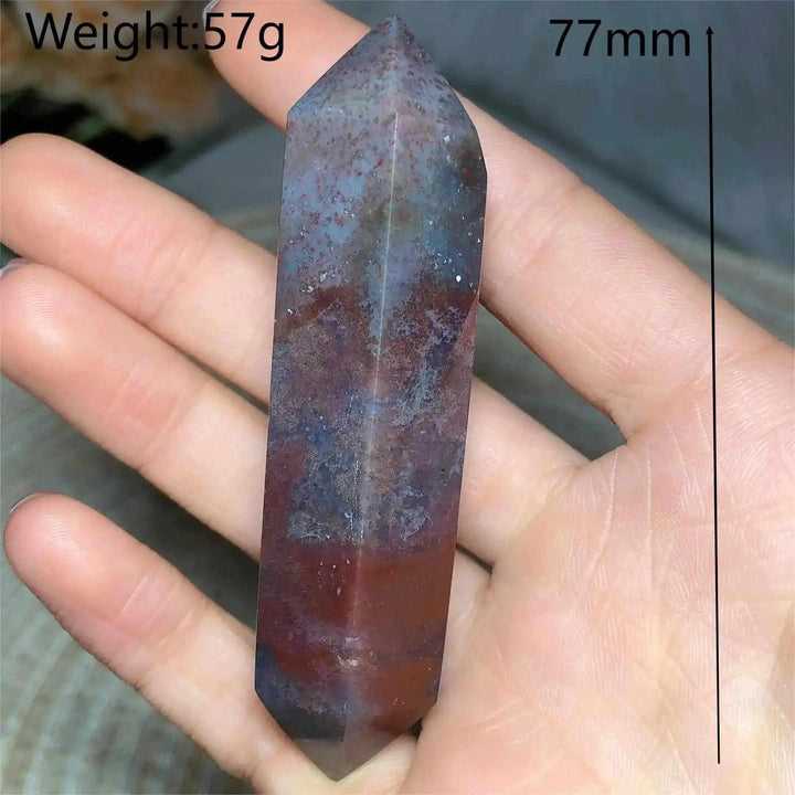Polished 77mm Ocean Jasper double point tower featuring earthy red and blue tones, perfect for heart chakra healing.