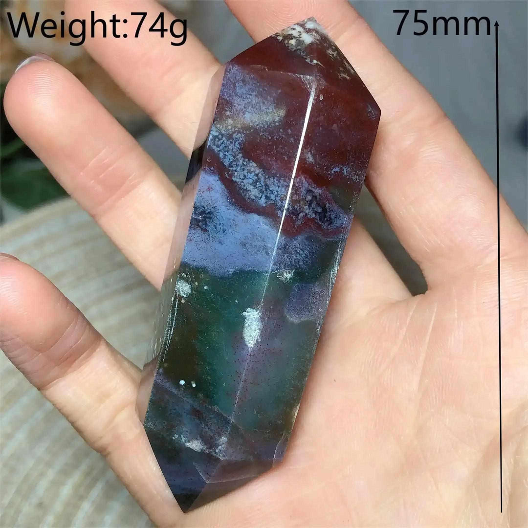 Polished 75mm Ocean Jasper double point tower featuring vibrant green, cream, and red orb patterns for heart chakra healing.