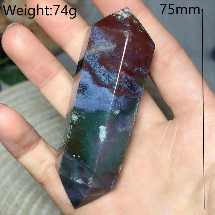 Polished 75mm Ocean Jasper double point tower featuring vibrant green, cream, and red orb patterns for heart chakra healing.