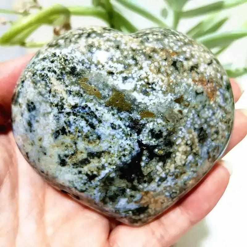 Polished Ocean Jasper heart featuring sea green, cream, and blush orb patterns for calming Heart Chakra energy.