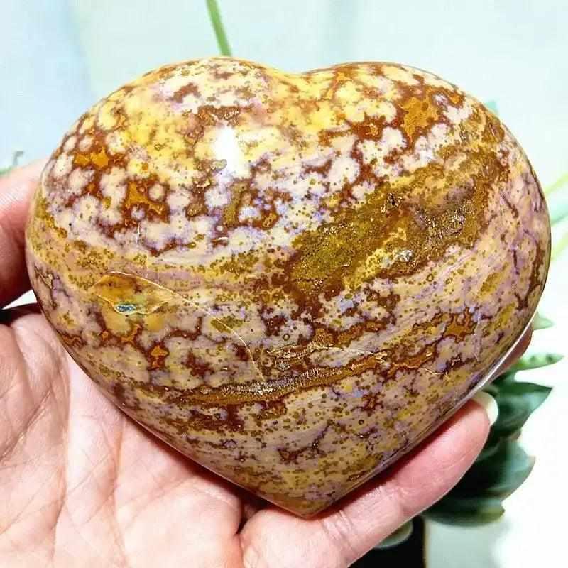 Polished Ocean Jasper heart with orb patterns in sea green, cream, and blush tones for Heart Chakra calming and healing.