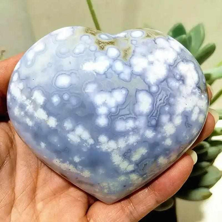 Polished Ocean Jasper heart with soft sea green and cream orb patterns, perfect for Heart Chakra calm and reflection.