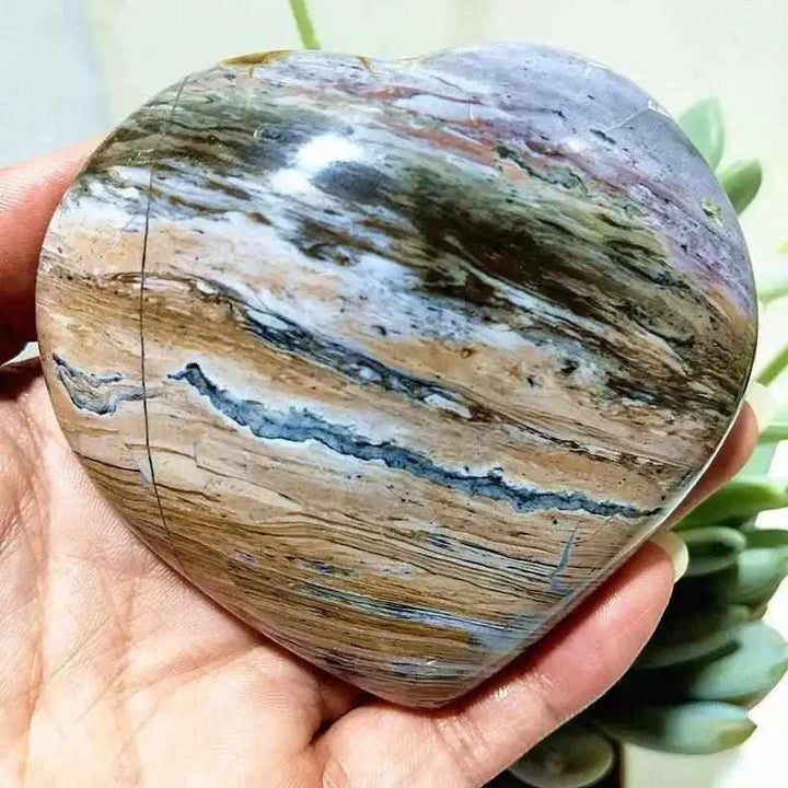 Polished Ocean Jasper heart featuring calming sea green, cream, and blush orb patterns for Heart Chakra healing.